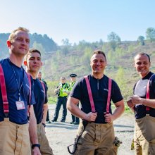 Four firefighers pose for the camera near Ilkley